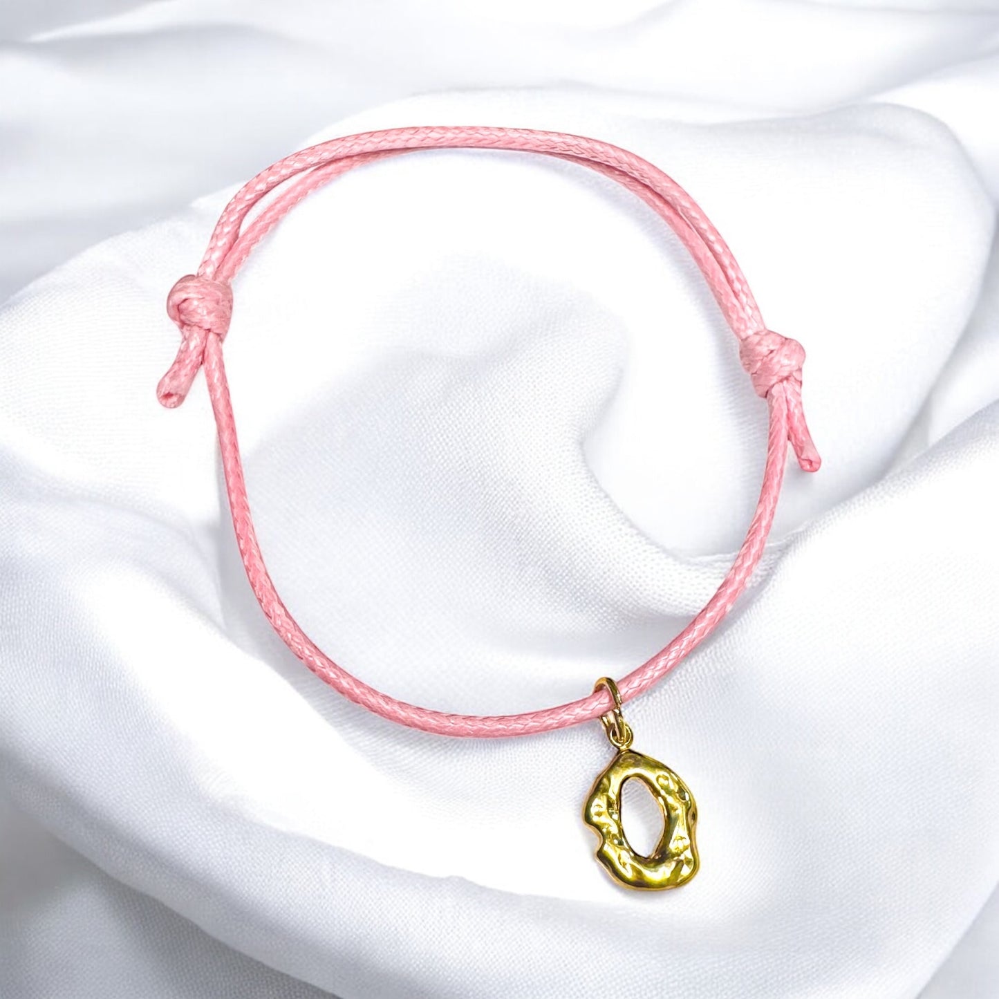 Amira Pink Cord Bracelet with Gold Textured Oval Charm | Adjustable - Razzle and Rose Jewellery