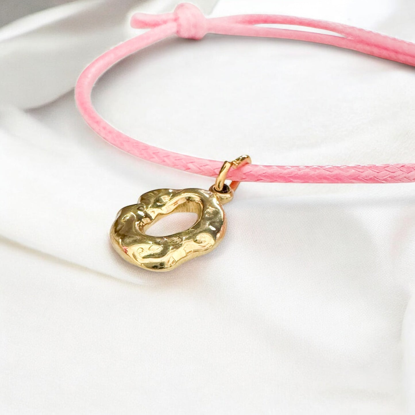 Amira Pink Cord Bracelet with Gold Textured Oval Charm | Adjustable - Razzle and Rose Jewellery