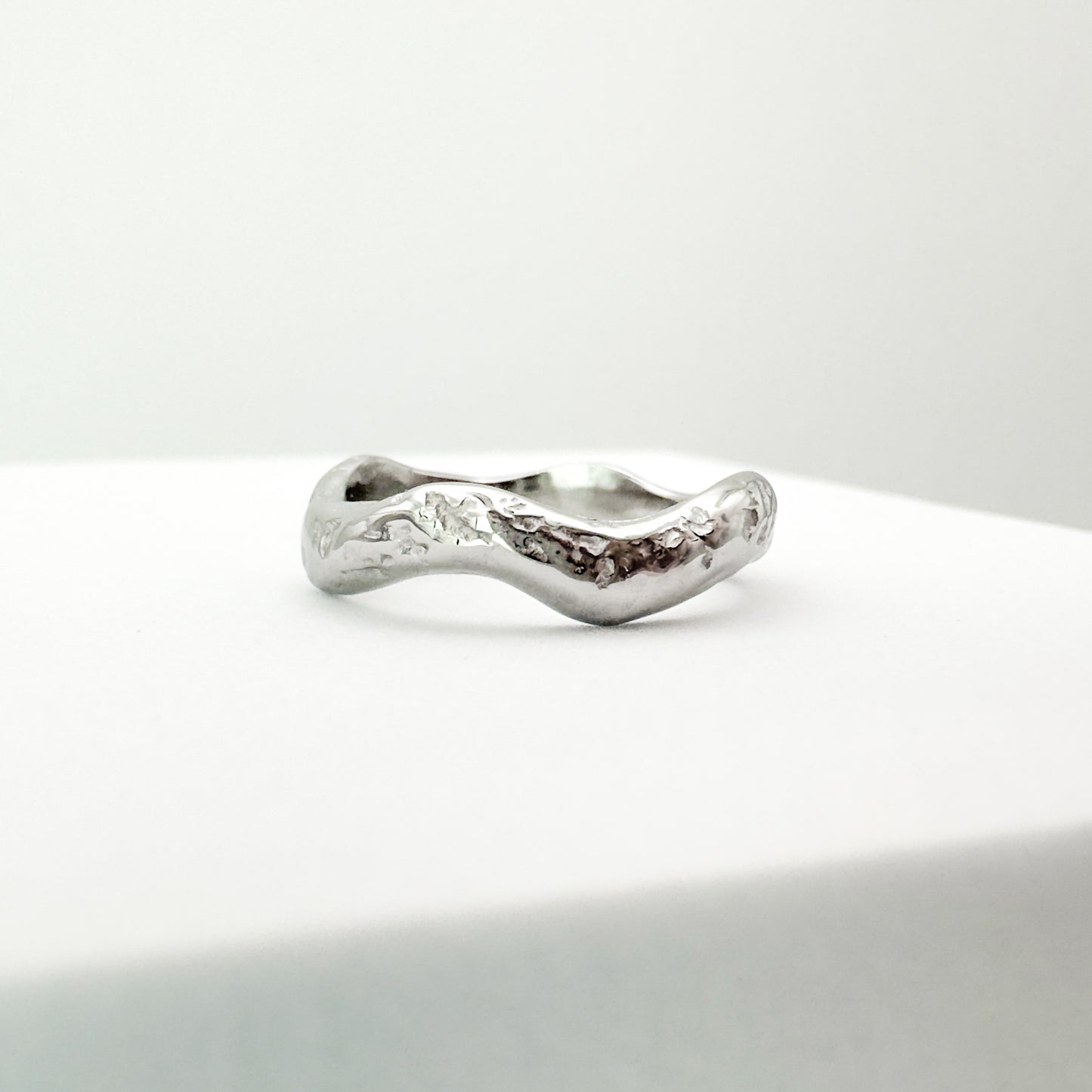 Inez White Gold Wave Textured Ring
