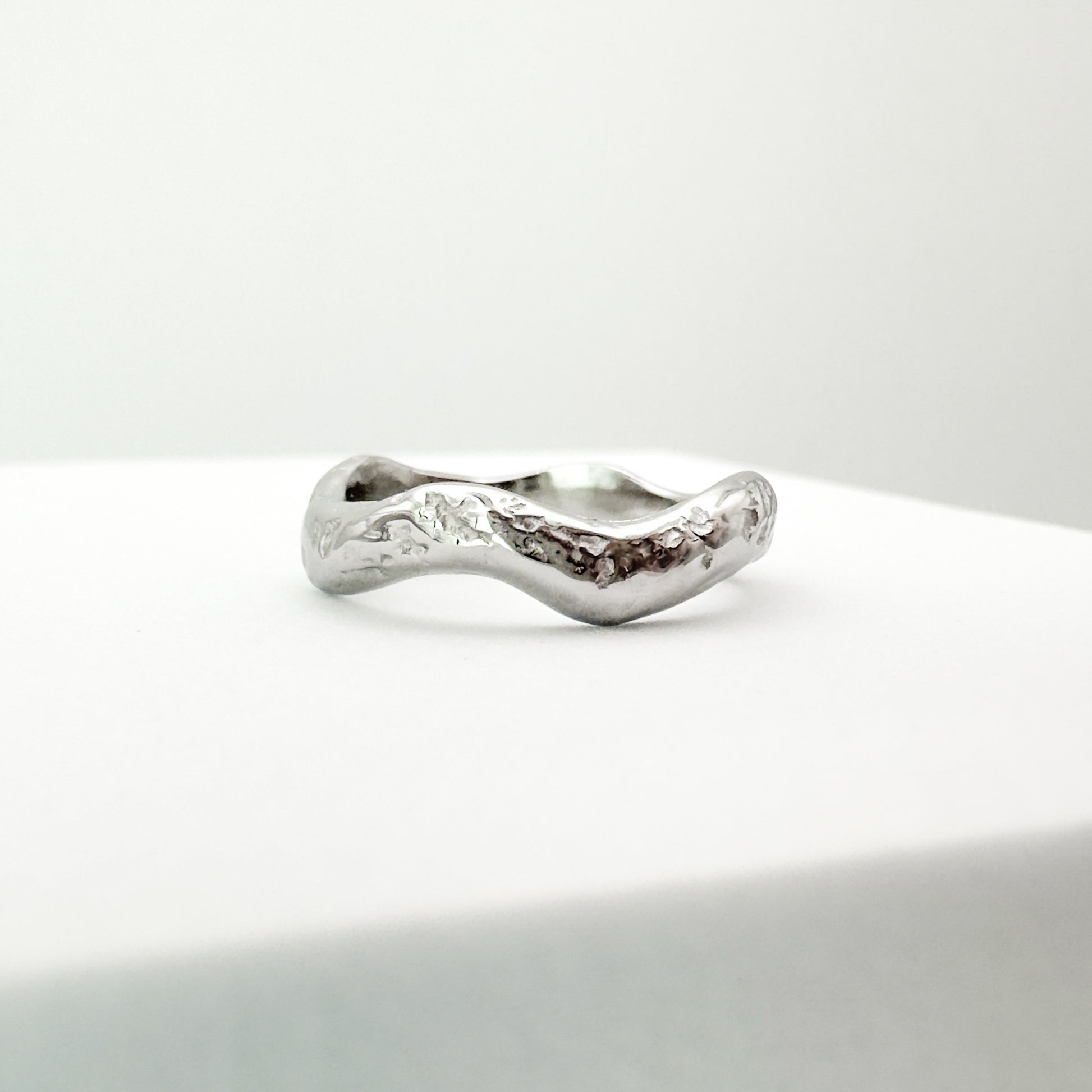 Inez White Gold Wave Textured Ring